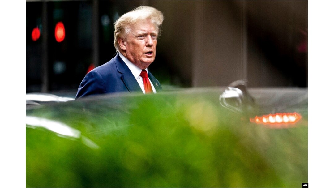 FILE - Former President Donald Trump departs Trump Tower, Aug. 10, 2022, in New York.