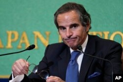 FILE - Director General of the International Atomic Energy Agency (IAEA) Rafael Grossi speaks during a news conference in Tokyo, May 20, 2022.