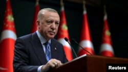 FILE - Turkish President Recep Tayyip Erdogan speaks after a cabinet meeting in Ankara, May 17, 2021. Erdogan told parliamentary deputies Oct. 20, 2022, that Turkey had secured a vital opportunity by agreeing to a Russian plan to form a natural gas hub in Turkey.