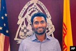This undated photo released by the City of Española shows Muhammad Afzaal Hussain, 27, a planning and land use director who was killed in Albuquerque, N.M., on Aug. 1, 2022.