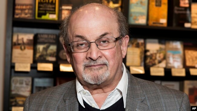 FILE - Author Salman Rushdie appears at a signing for his book