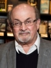 FILE - Author Salman Rushdie appears at a signing for his book "Home" in London on June 6, 2017