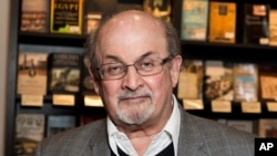 FILE - Author Salman Rushdie appears at a signing for his book "Home" in London on June 6, 2017. His new novel, written before he was stabbed at a book appearance in New York in 2022, will be released Feb. 7, 2023, in the U.S. and two days later in Britain. 