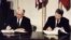 FILE - U.S. President Ronald Reagan and Soviet President Mikhail Gorbachev sign the Intermediate-Range Nuclear Forces treaty in Washington, Dec. 8 1987. Russian President Vladimir Putin wants to resume production of intermediate- and shorter-range nuclear-capable missiles.
