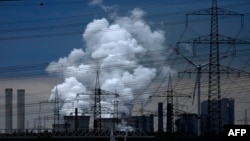 FILE - Coal-fired power plants of German energy giant RWE is seen at Niederaussem, western Germany, Apr. 25, 2019.