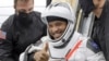 FILE - NASA astronaut Victor Glover is helped out of the SpaceX Crew Dragon Resilience spacecraft onboard the SpaceX GO Navigator recovery ship, May 2, 2021.