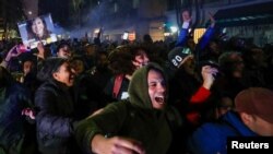 Supporters gather outside the house of Argentina's Vice President Cristina Fernandez de Kirchner, days after Fernandez was accused in a corruption case, in Buenos Aires, Aug. 27, 2022.