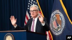 FILE: Federal Reserve Chairman Jerome Powell speaks during a news conference at the Federal Reserve Board building in Washington. Taken 7.27.2022