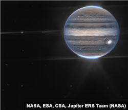 NASA’s James Webb Space Telescope captures new images of Jupiter showcasing auroras and hazes. Webb sees Jupiter with its faint rings, which are a million times fainter than the planet, and two tiny moons called Amalthea and Adrastea.