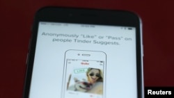 The dating app Tinder is shown on an Apple iPhone in this photo illustration taken February 10, 2016.