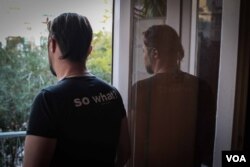 Eliot, who never intended to make Greece his home, shares his house in Athens with other LGBTQI refugees. While he remains in Greece, he faces the discrimination that comes with his LGBTQ status. (VOA/J. Owens)