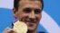 Ryan Lochte of the U.S. poses with his gold medal on the podium after winning the men's 400m individual medley final at the London 2012 Olympic Games at the Aquatics Centre July 28, 2012. 