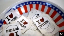 I voted stickers are seen at a polling place, March 15, 2020, in Steubenville, Ohio where polling was postponed as a result of the coronavirus pandemic