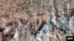 Satelitski snimak kompanije Maksar pokazuje površinu u Teksasu koja je zahvaćena požarima (Satellite image ©2024 Maxar Technologies / AFP)