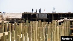 La reconstrucción de la costa de Nueva Jersey tras el huracán Sandy ha generado un nuevo debate sobre el aumento del nivel del mar.
