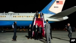 U.S. Secretary of State Mike Pompeo and his wife Susan arrive at Abu Dhabi International Airport in Abu Dhabi, United Arab Emirates, Friday, Jan. 11, 2019.