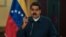 FILE - Venezuela's President Nicolas Maduro speaks during a meeting with ministers at the Miraflores Palace in Caracas, Venezuela, Aug. 13, 2018. 