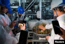 A view of the base of the soon-to-be-completed and sealed central detector at the Jiangmen Underground Neutrino Observatory (JUNO), during an organized tour in Kaiping, Guangdong province, China October 11, 2024. (REUTERS/Ryan Woo)