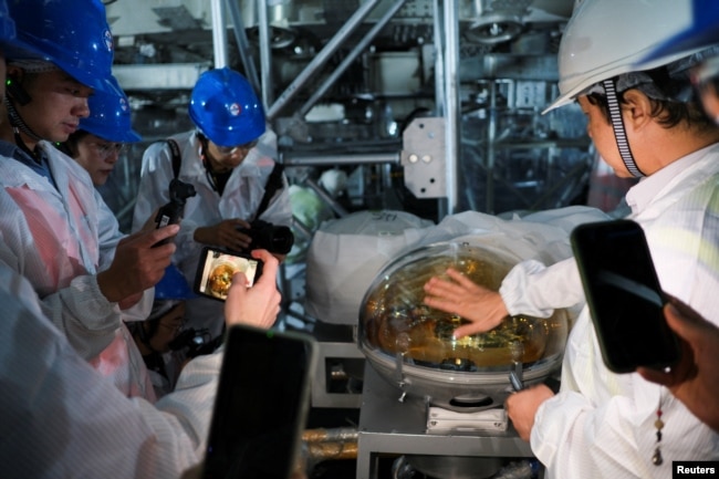 A view of the base of the soon-to-be-completed and sealed central detector at the Jiangmen Underground Neutrino Observatory (JUNO), during an organized tour in Kaiping, Guangdong province, China October 11, 2024. (REUTERS/Ryan Woo)