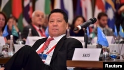 FILE - Ng Lap Seng attends a forum in Macau, China, in this handout photo taken on Aug. 25, 2015.