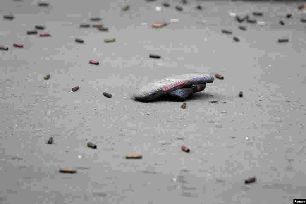 A slipper is seen amid bullet casings in the Ain el-Hilweh Palestinian refugee camp in southern Lebanon.