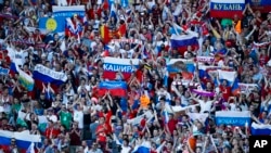 Russian fans cheer for their team during the Euro 2016 Group B match between Russia and Wales in Toulouse, France, June 20, 2016. Wales won 3-0.