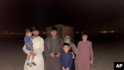 In this photo provided to The Associated Press, Mohammad Khalid Wardak is seen in Afghanistan on Aug. 18, 2021, after the US military and its allies rescued him and his family.