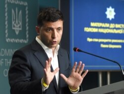 FILE - Ukrainian President Volodymyr Zelensky speaks during a press conference in Kyiv, July 23, 2019.