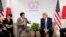 U.S President Donald Trump, right, and Japanese Prime Minister Shinzo Abe attend a bilateral meeting at the G-7 summit in Biarritz, France, Aug. 25, 2019. 