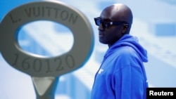 FILE - Designer Virgil Abloh is seen before his Fall/Winter 2020 collection show for fashion house Louis Vuitton during Men's Fashion Week in Paris, France, Jan. 16, 2020.