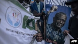 FILE — Supporters of Congolese doctor and presidential candidate Denis Mukwege attend a campaign rally in Bukavu, capital of South Kivu province, eastern Democratic Republic of Congo, Nov. 25, 2023.