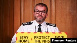 Martin Hewitt, chair of the National Police Chiefs' Council, speaks at a coronavirus disease (COVID-19) news conference at Downing Street, in London, Britain, January 12, 2021.