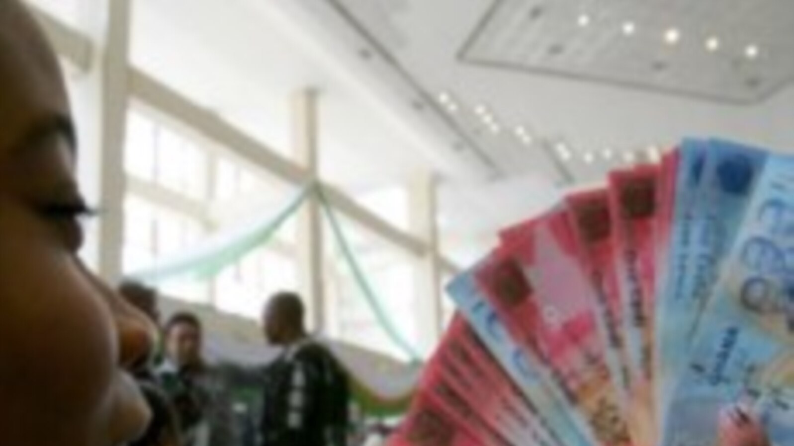 Microfinance Services in Ghana Greeted With Hope, Concern