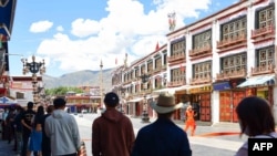 People line up for COVID-19 tests in Lhasa, in China's western Tibet Autonomous Region, Aug. 9, 2022.