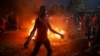 Demonstrators protest following the announcement of the results of Kenya's presidential election, in Nairobi, Kenya, Aug. 15, 2022.