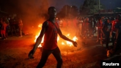Demonstrators protest following the announcement of the results of Kenya's presidential election, in Nairobi, Kenya, Aug. 15, 2022.