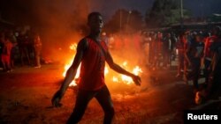 Demonstrators protest following the announcement of the results of Kenya's presidential election, in Nairobi, Kenya, Aug. 15, 2022.