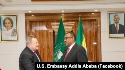 FILE: Ambassador Mike Hammer (left) and Ethiopia Deputy Prime Minister and Minister of Foreign Affairs Demeke Mekonnen. Taken 8.9.2022