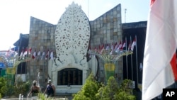 Tourists visit the Bali Bombing Memorial in Kuta, Bali, Indonesia,, Aug. 19, 2022. A reduction in the prison sentence of the bombmaker in the Bali terror attack that killed 202 people could free him within days if he's granted parole.