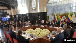 Reunión presidencial durante la Cumbre de la Comunidad Andina en Lima, Perú, 26 de mayo de 2019. Freddy Zarco/Cortesía de la Presidencia de Bolivia/vía REUTERS. 