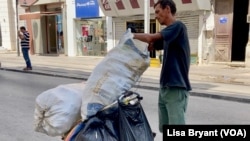 Former tourism worker Mohammed now recycles plastic and yearns for prosperous days.