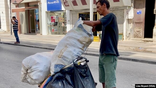 Former tourism worker Mohammed now recycles plastic and yearns for prosperous days.