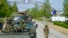 FILE - A Russian military convoy is seen on the road toward the Zaporizhzhia Nuclear Power Station, in Enerhodar, Zaporizhzhia region, in territory under Russian military control, southeastern Ukraine, on May 1, 2022.
