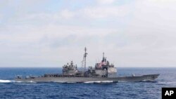 FILE - The guided-missile cruiser USS 'Chancellorsville' transits the Philippine Sea, June 18, 2016. The U.S. Navy is sailing the USS 'Chancellorsville' and the USS 'Antietam' warships through the Taiwan Strait, Aug. 28, 2022. (Mass Communication Speciali