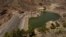 Aerial view of La Sorrueda reservoir in Santa Lucia de Tirajana at 10 percent of its capacity, in the island of Gran Canaria, Spain, Aug. 6, 2022. 