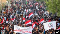 تظاهرات گروه‌های مورد حمایت جمهوری اسلامی ایران علیه مقتدی صدر. بغداد، عراق. ١٢ اوت ٢٠٢٢