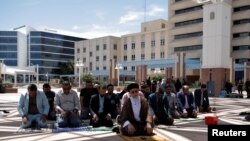 Sayyid M.B. Kashmiri leads prayer at an event against anti-Shia hate following the murders of four Muslim men in the city of Albuquerque in the state of New Mexico, U.S., Aug. 12, 2022. Police believe the son of the suspect in the killings might have played a role in the murders.