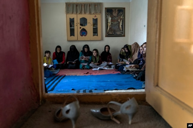 Afghan girls attend a class in an underground school, in Kabul, Afghanistan, Saturday, July 30, 2022. For most teenage girls in Afghanistan, it’s been a year since they set foot in a classroom. (AP Photo/Ebrahim Noroozi)