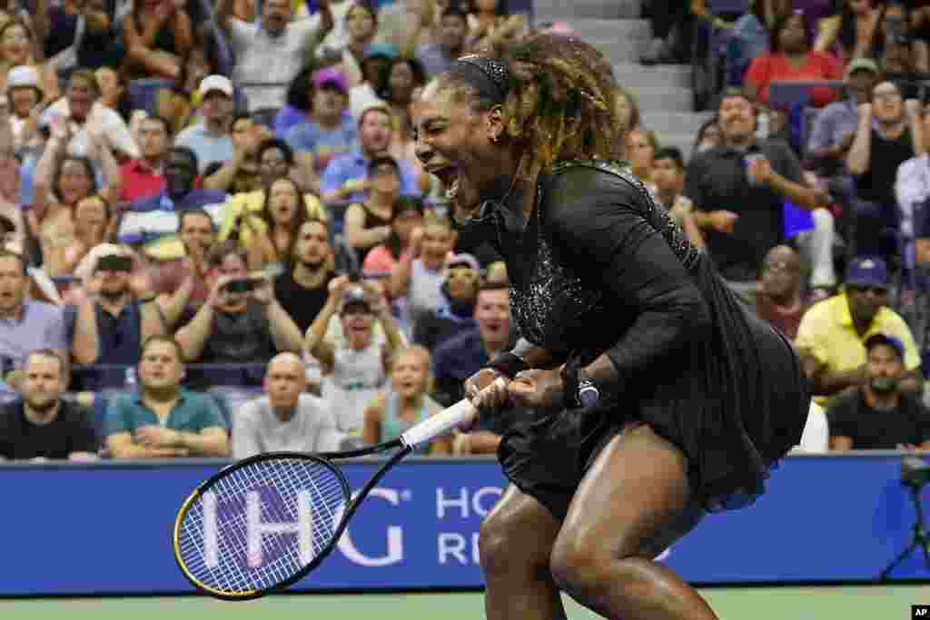 Serena Williams of the United States reacts during the first round of the U.S. Open tennis championships against Danka Kovinic, of Montenegro, Aug. 29, 2022, in New York.