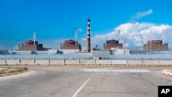 FILE - This handout photo taken from video and released by Russian Defense Ministry Press Service on Aug. 7, 2022, gives a general view of the Zaporizhzhia Nuclear Power Station in territory under Russian military control, southeastern Ukraine. 